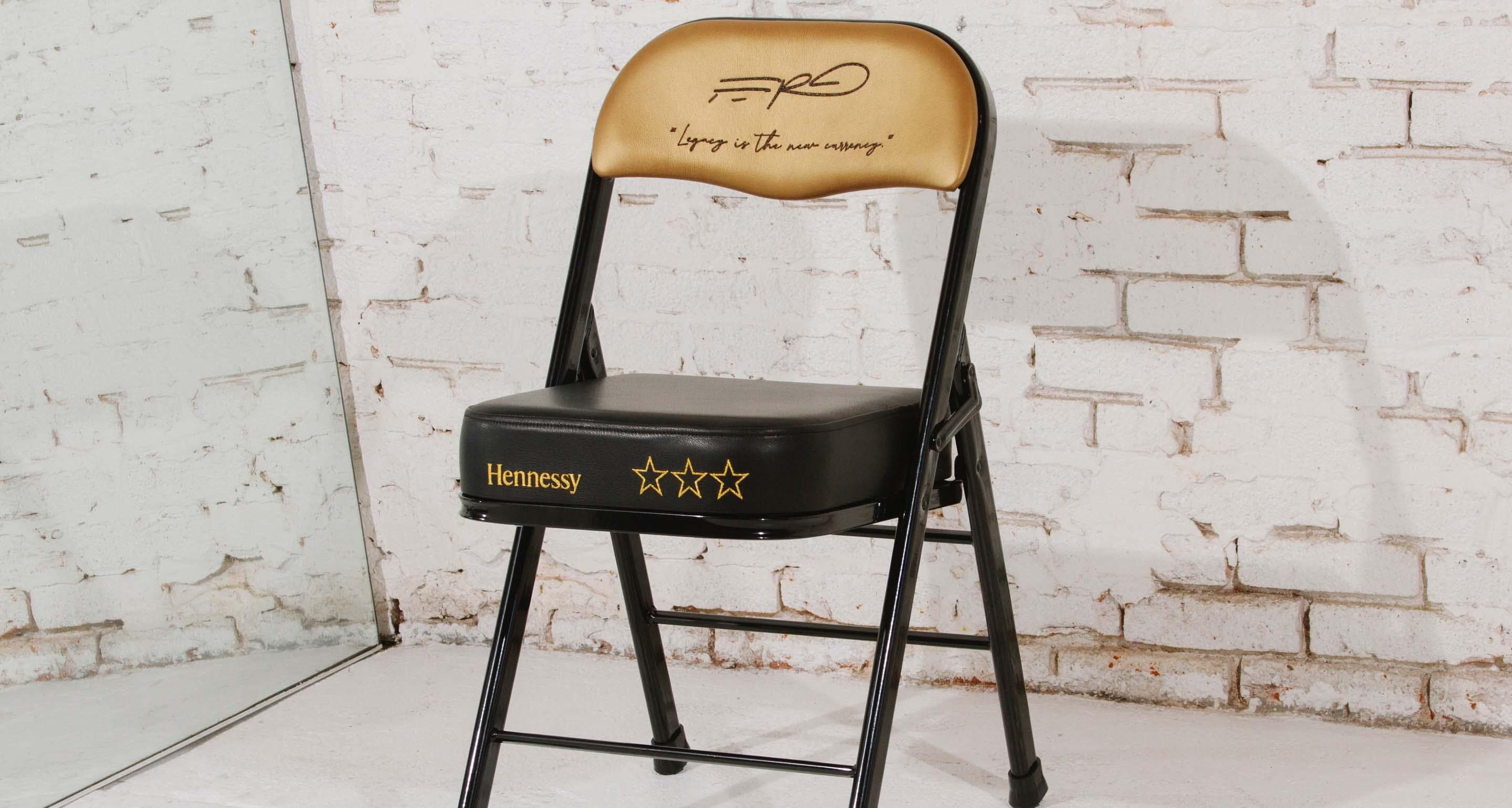 A custom wrapped floor seat, with Hennessy and ASAP Ferg logos.