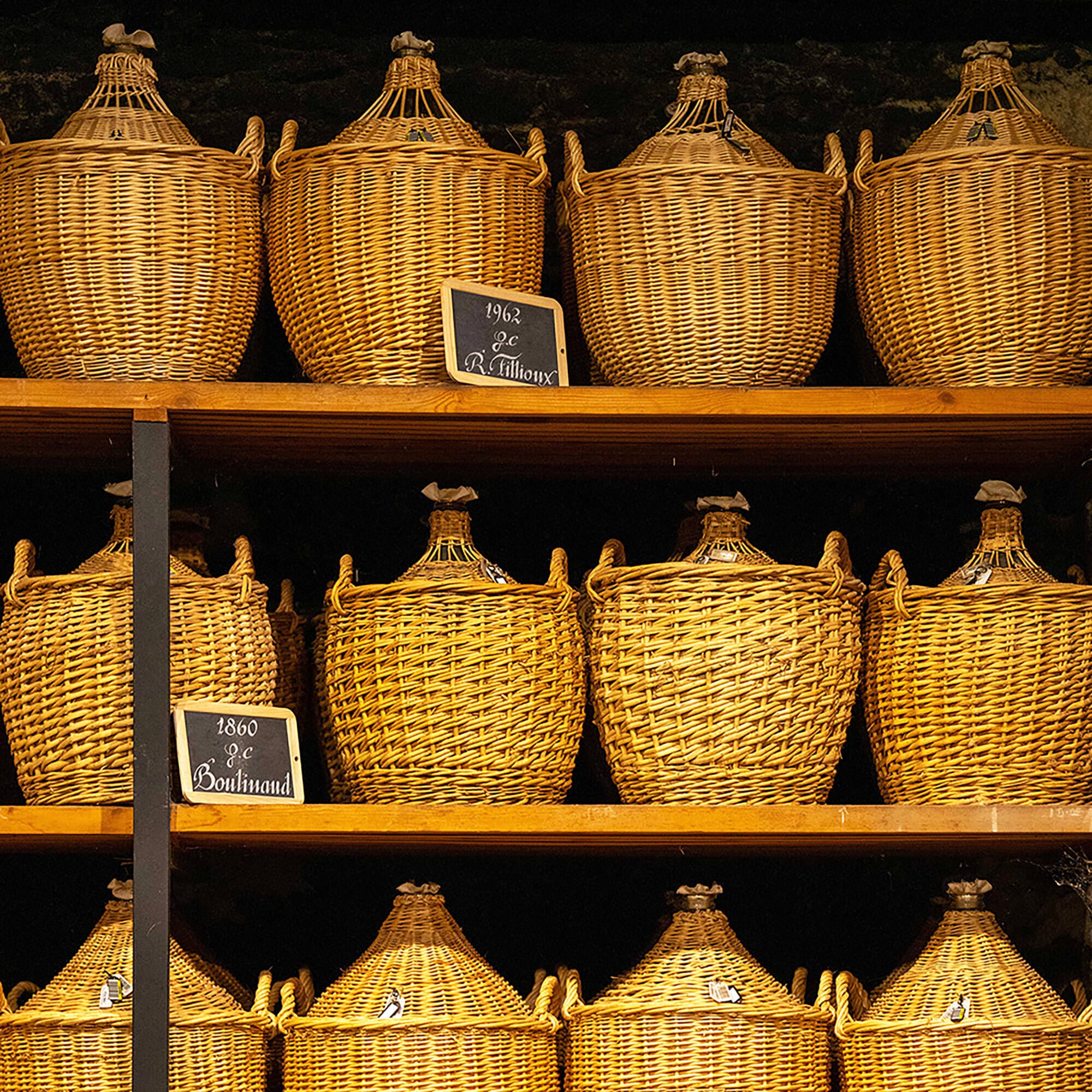 Antique demi-johns in Hennessy's historical Founder's Cellar