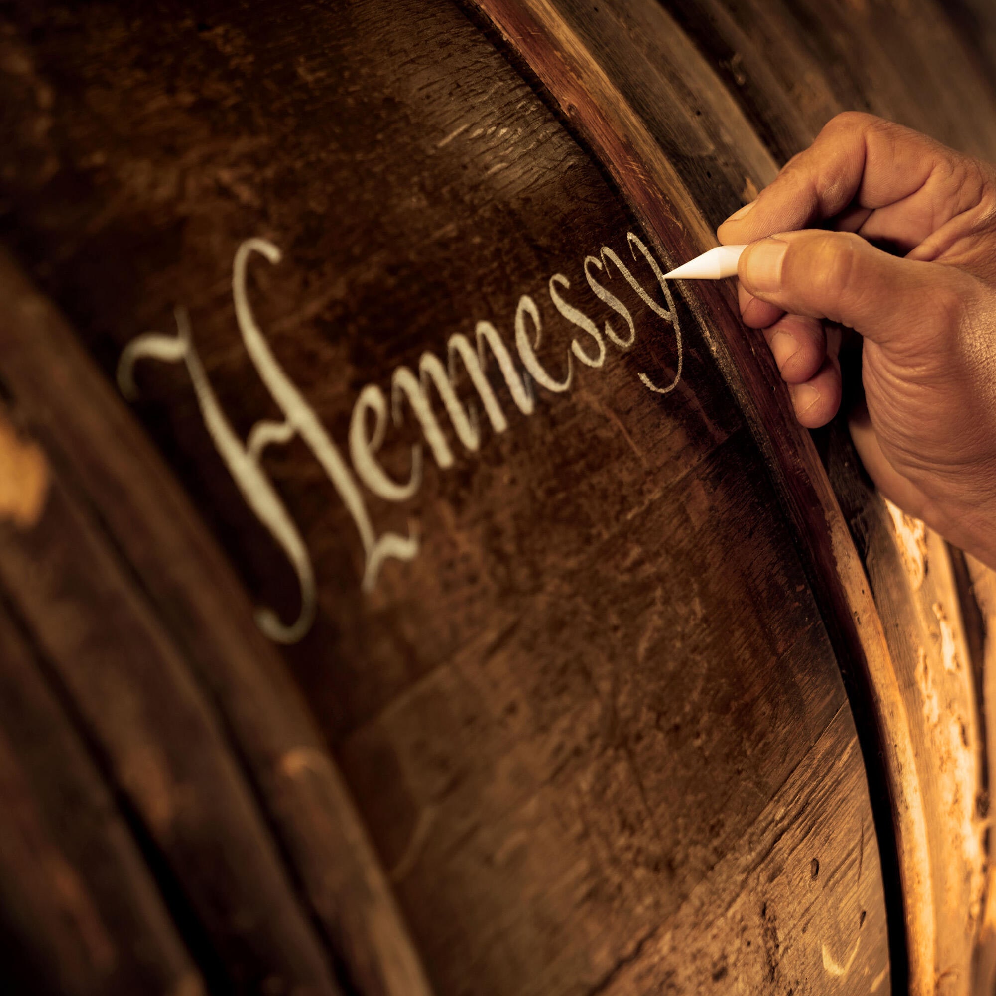 Hand calligraphy on a Hennessy barrel